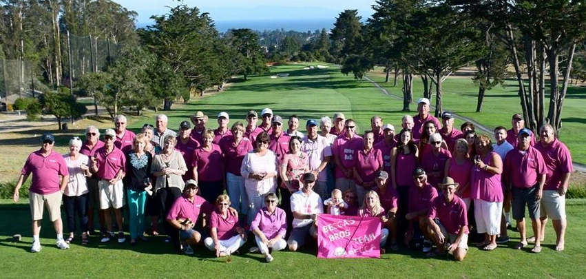 Golfers in pink at Pasatiempo golf course in Santa Cruz posing for a group photo