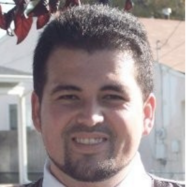 headshot of man smiling